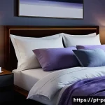 불면증 치료 성공 후기 - A cozy bedroom scene during nighttime showing a modern, well-organized room with blackout curtains d...